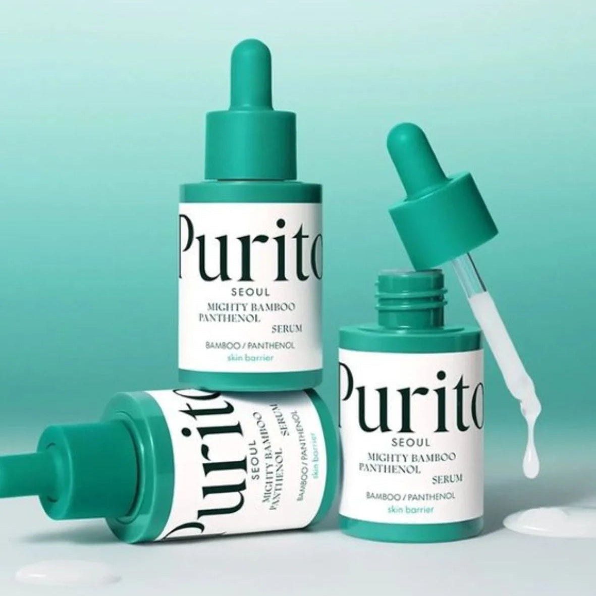 Purito skincare serum bottles with droppers on a light green background